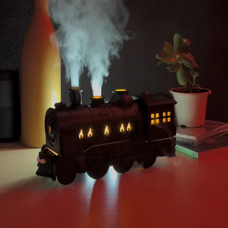 Humidifier styled like a vintage train with LED mist effect